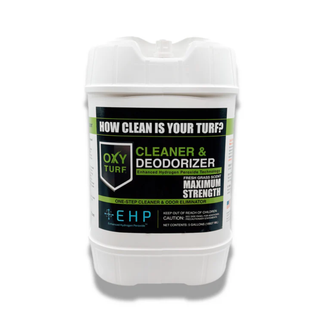 A white plastic container of Oxy Turf Cleaner & Deodorizer Maximum Strength on a white background with a soft shadow.